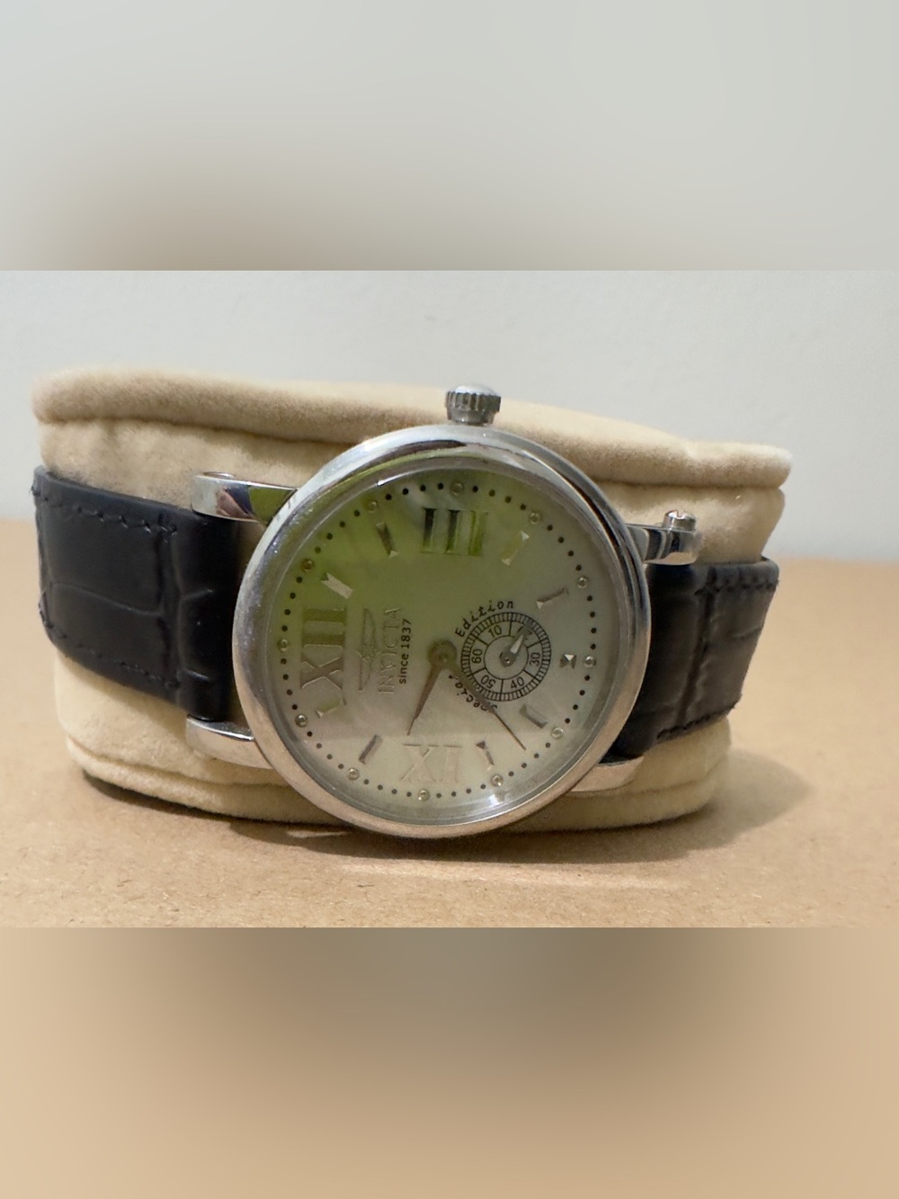 Classic Invicta Round Silver Watch with Black Leather Strap. Good condition.